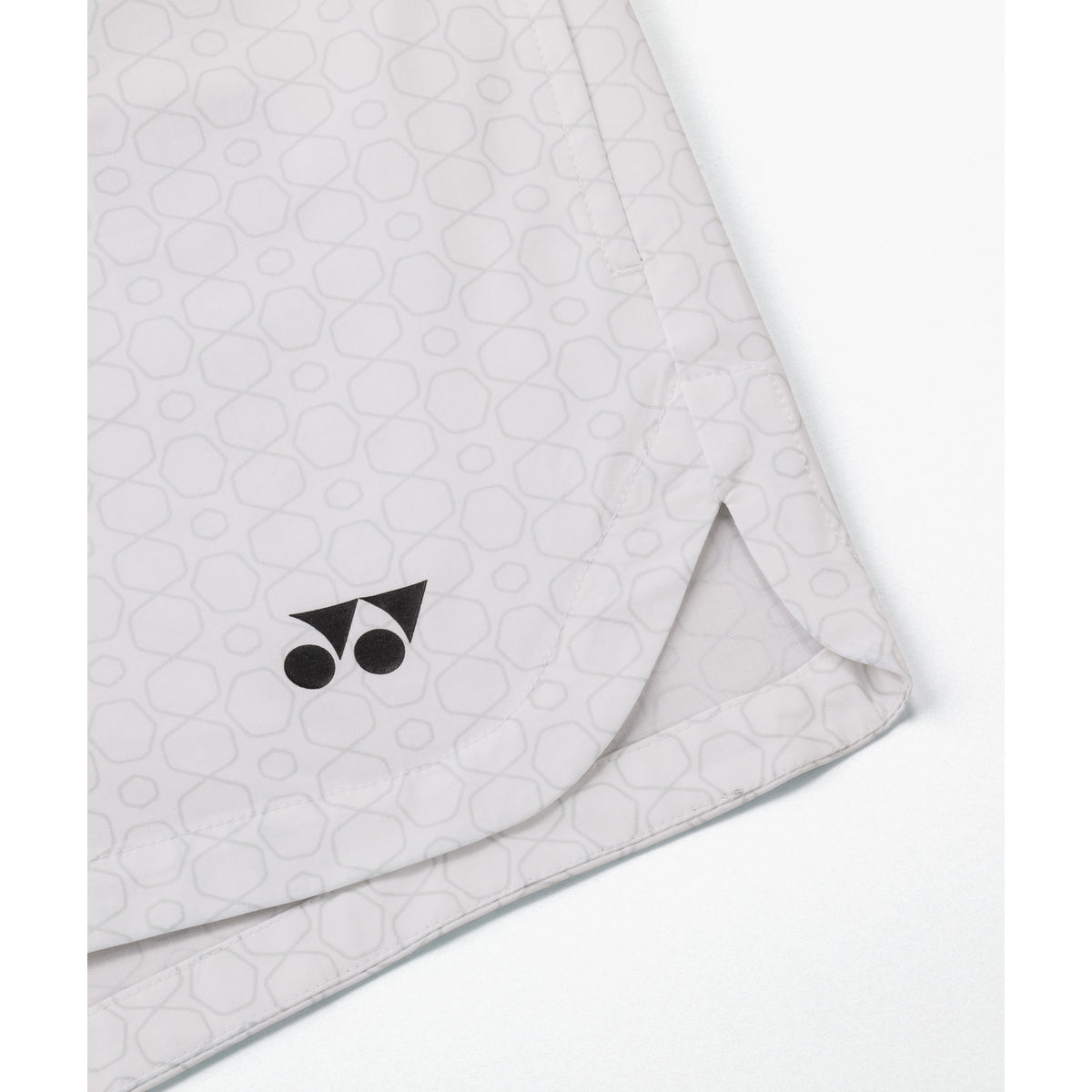 Yonex 25117 women's shorts in White - YONEX logo and side-slit hem detail